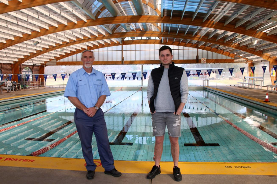 Image: Mayor Paul Harmon and pool operator, New England Aquatic’s Kyle Schuman inside the current Inverell pool facility.
