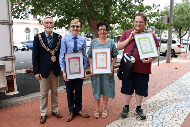 Image: Mayor Paul Harmon stands with 2020 winners Rohan Cowley, Trish Keightley and UnstopAbility.