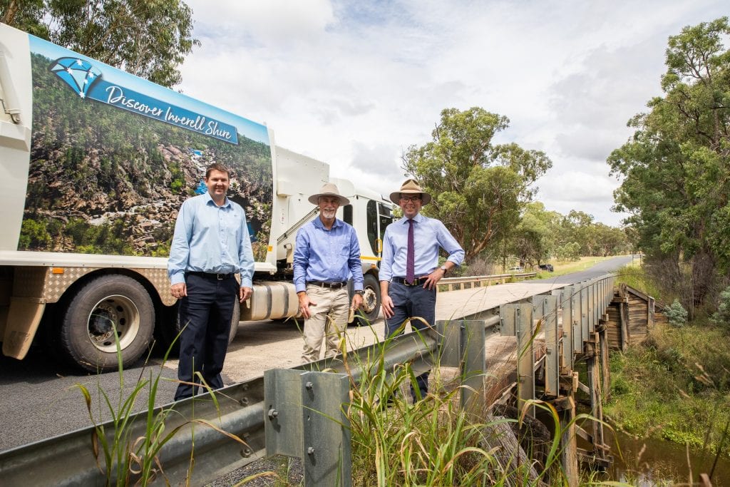 Image: The final timber bridge in the Inverell Shire – the 63-year-old timber Mathers Bridge over Frazers Creek at Nullamanna – will be replaced, thanks to a $1.83 million grant from the State Government, Inverell Shire Council’s Manager Civil Engineering Justin Pay, left, Mayor Paul Harmon and Northern Tablelands MP Adam Marshall.
